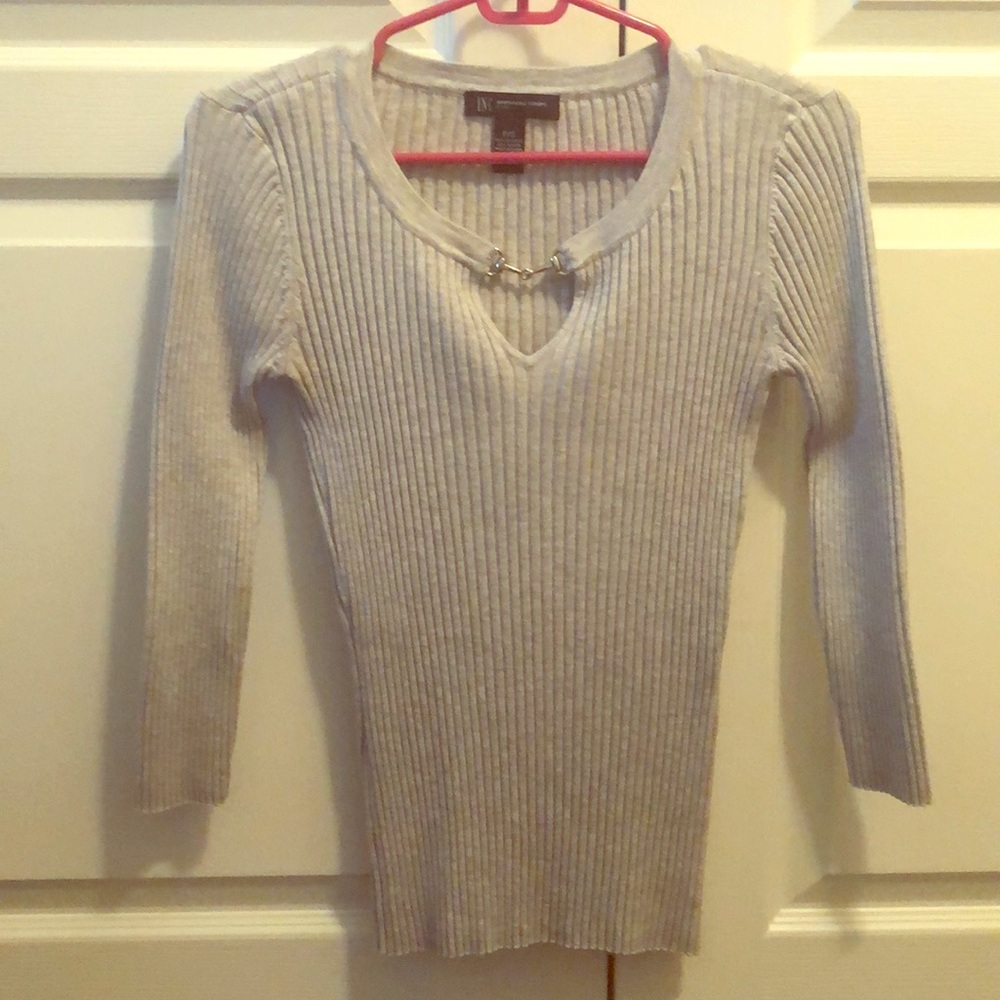 A beautiful gray blouse.